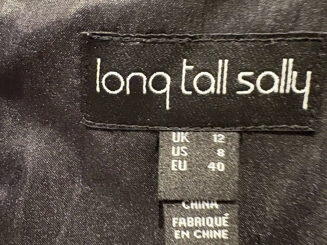 Billede 2 - Sort buksedragt, lange ben