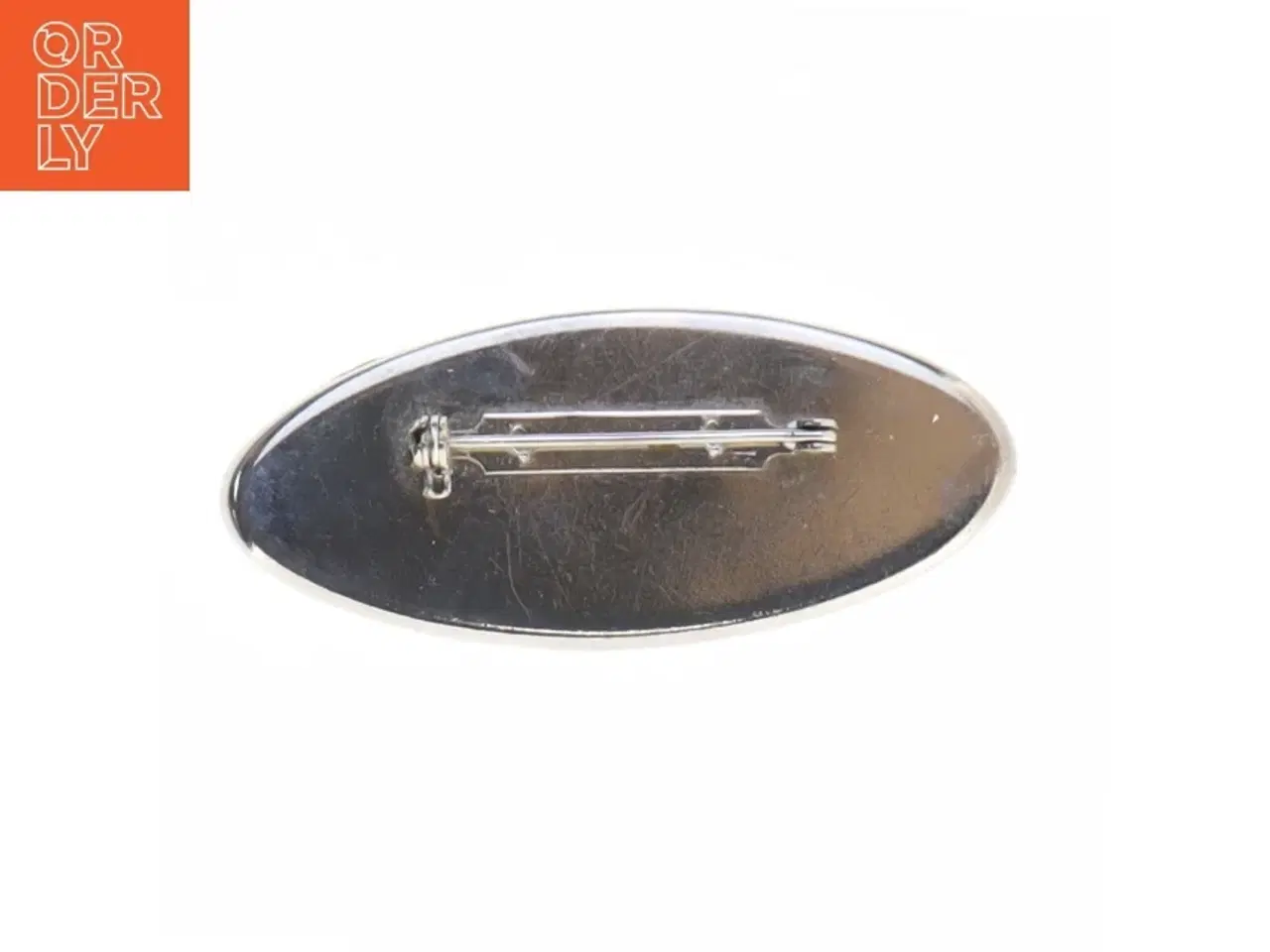 Billede 2 - Broche i sølvfarve med lilla emalje og sten (str. 6 x 2,6 cm)