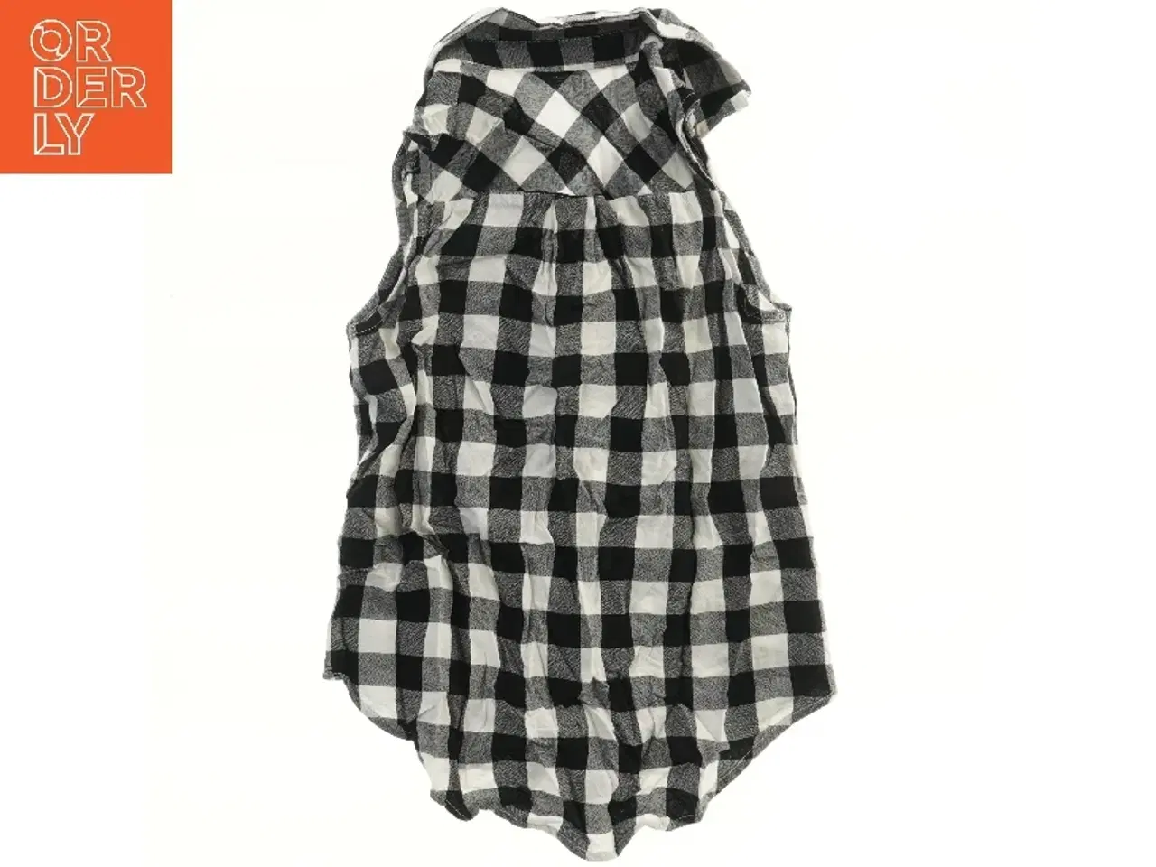 Billede 2 - Ærmeløs skjorte i sort-hvid tern fra H&M (str. 140)