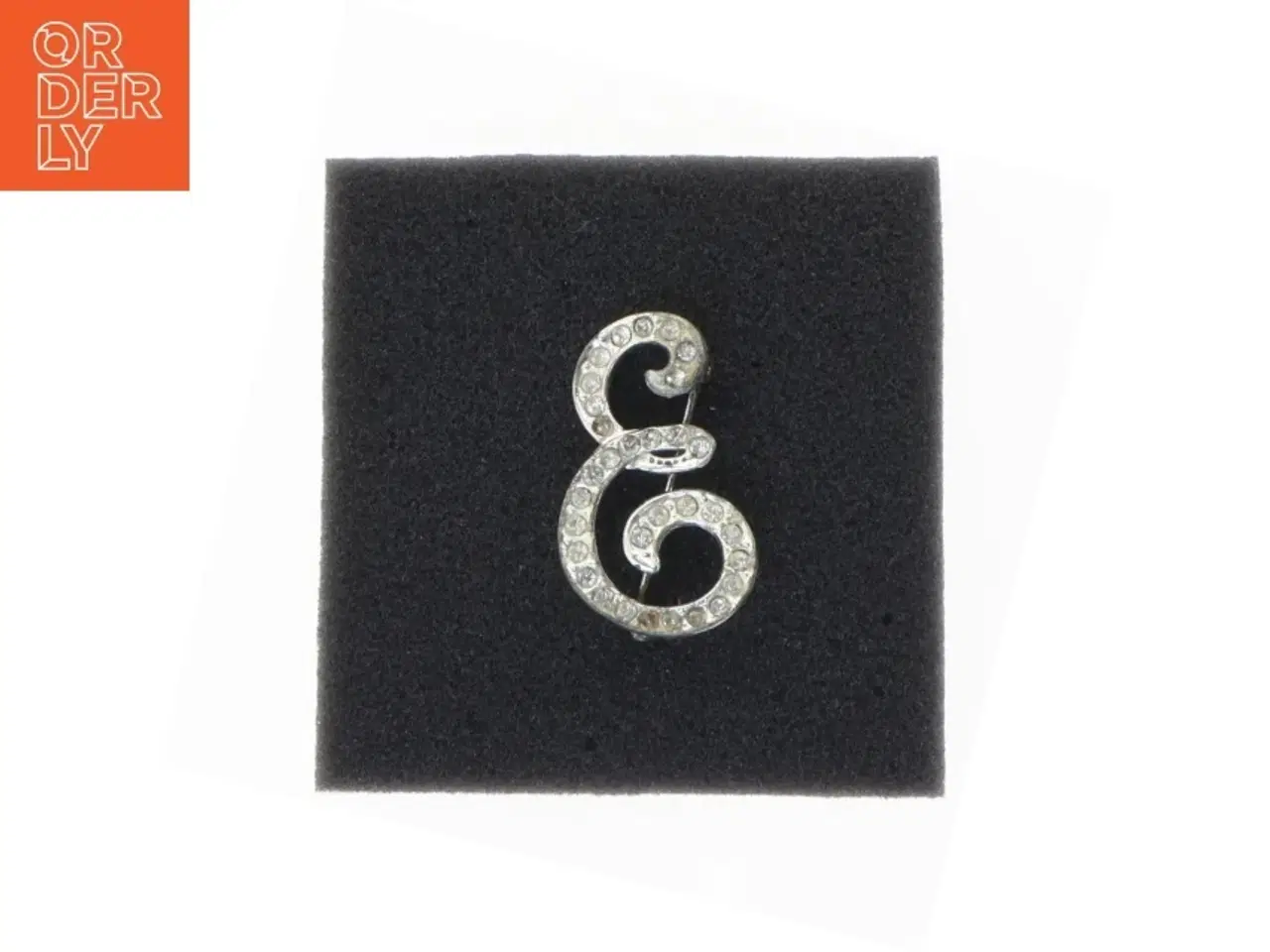Billede 1 - Sølvfarvet broche med sten (str. 3,5 x 2 cm)