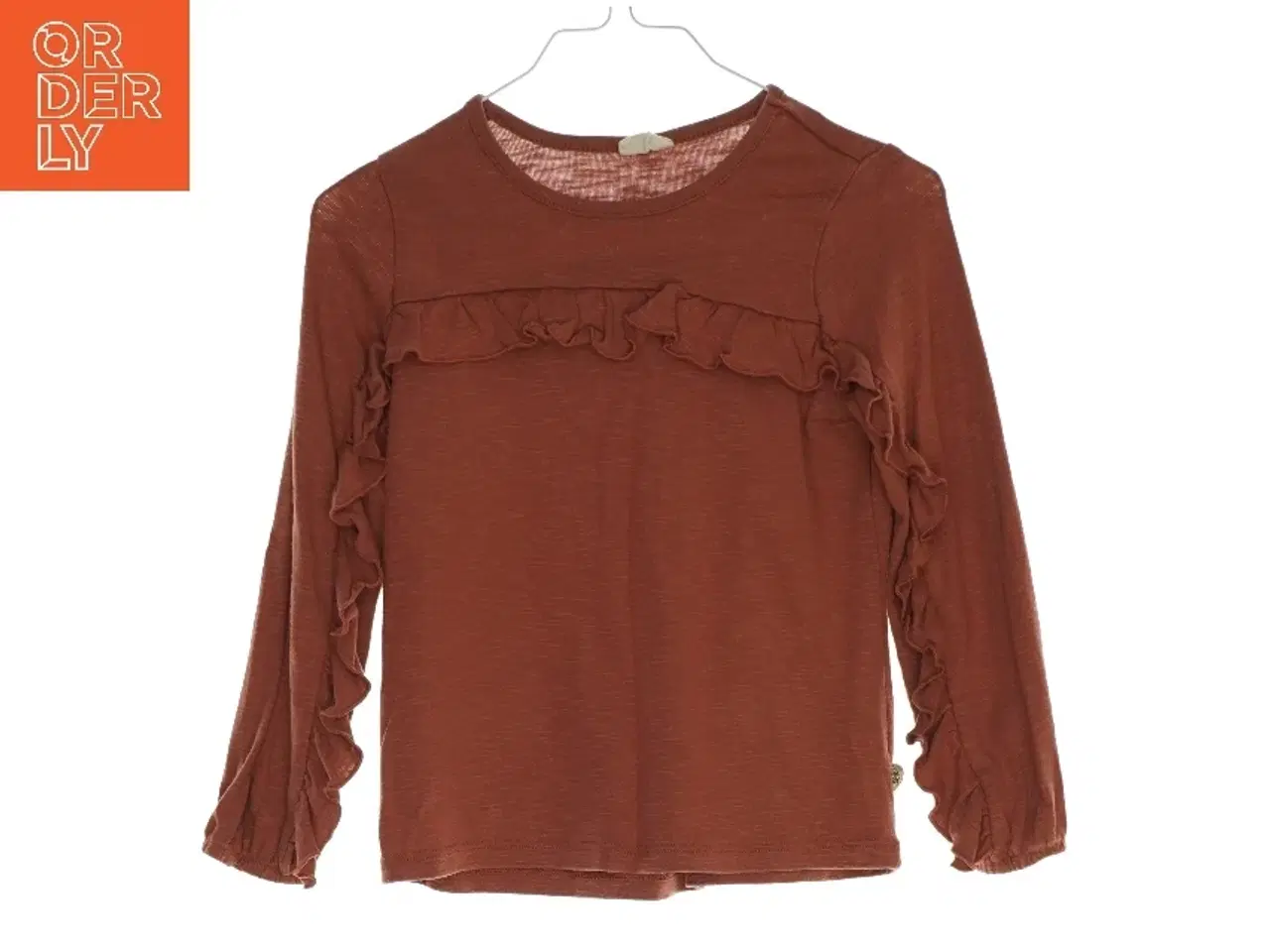 Billede 1 - Bluse med frynsede detaljer fra Pompdelux (str. 104)