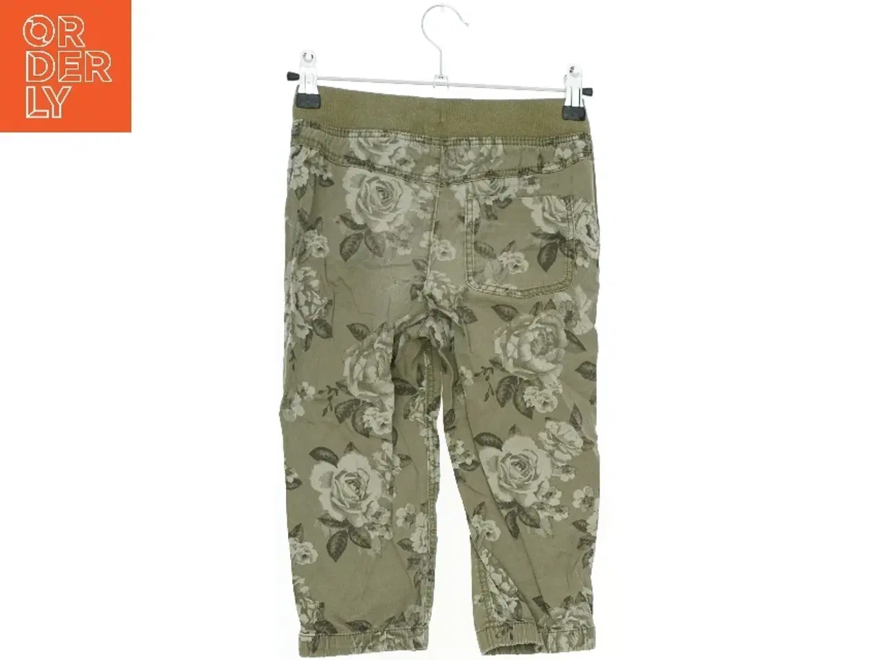Billede 2 - Blomstrede bukser til børn fra H&M (str. 122)