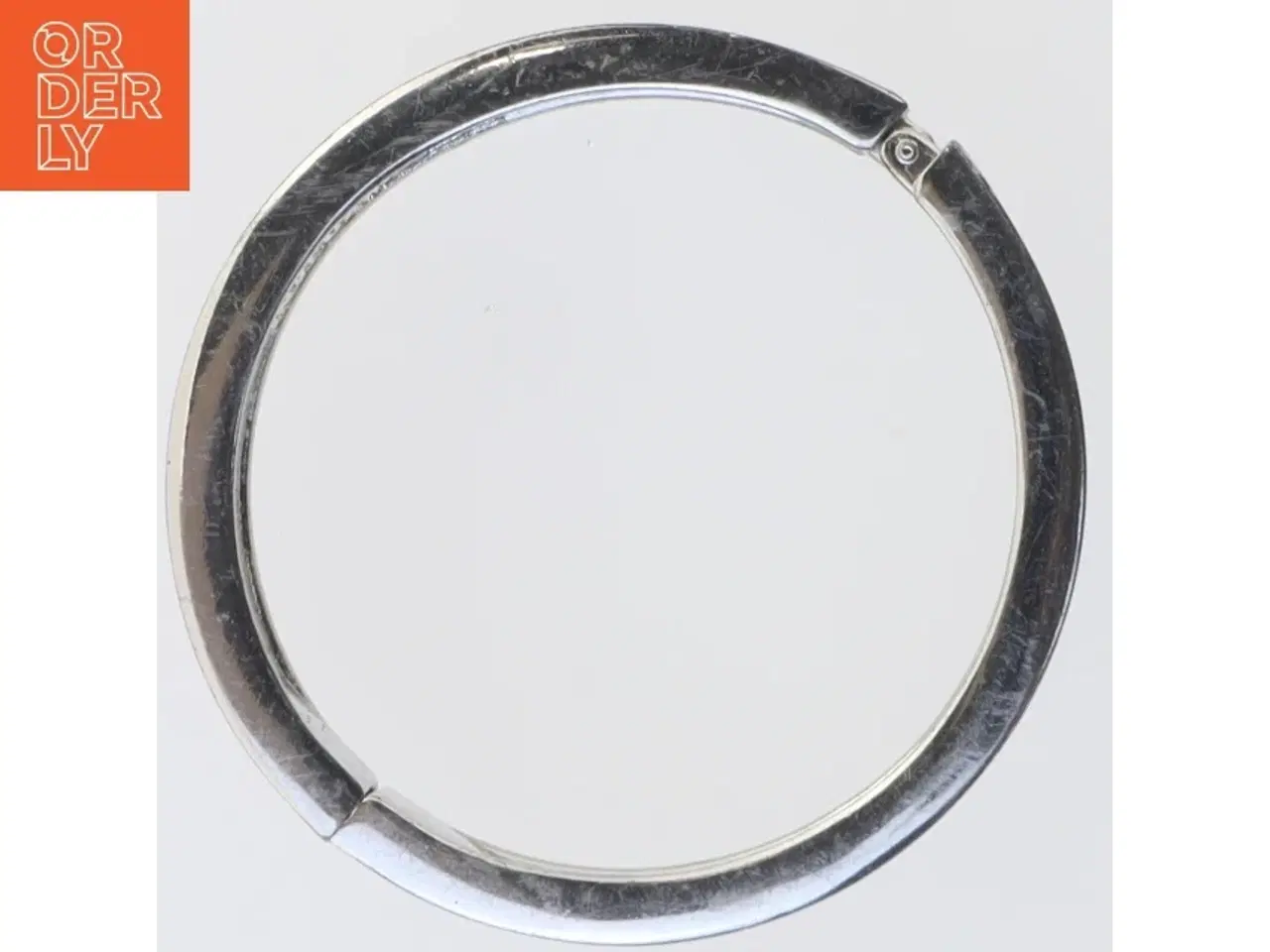 Billede 3 - Sølvfarvet manchetarmbånd fra Tokyo Jane (str. 7 cm)