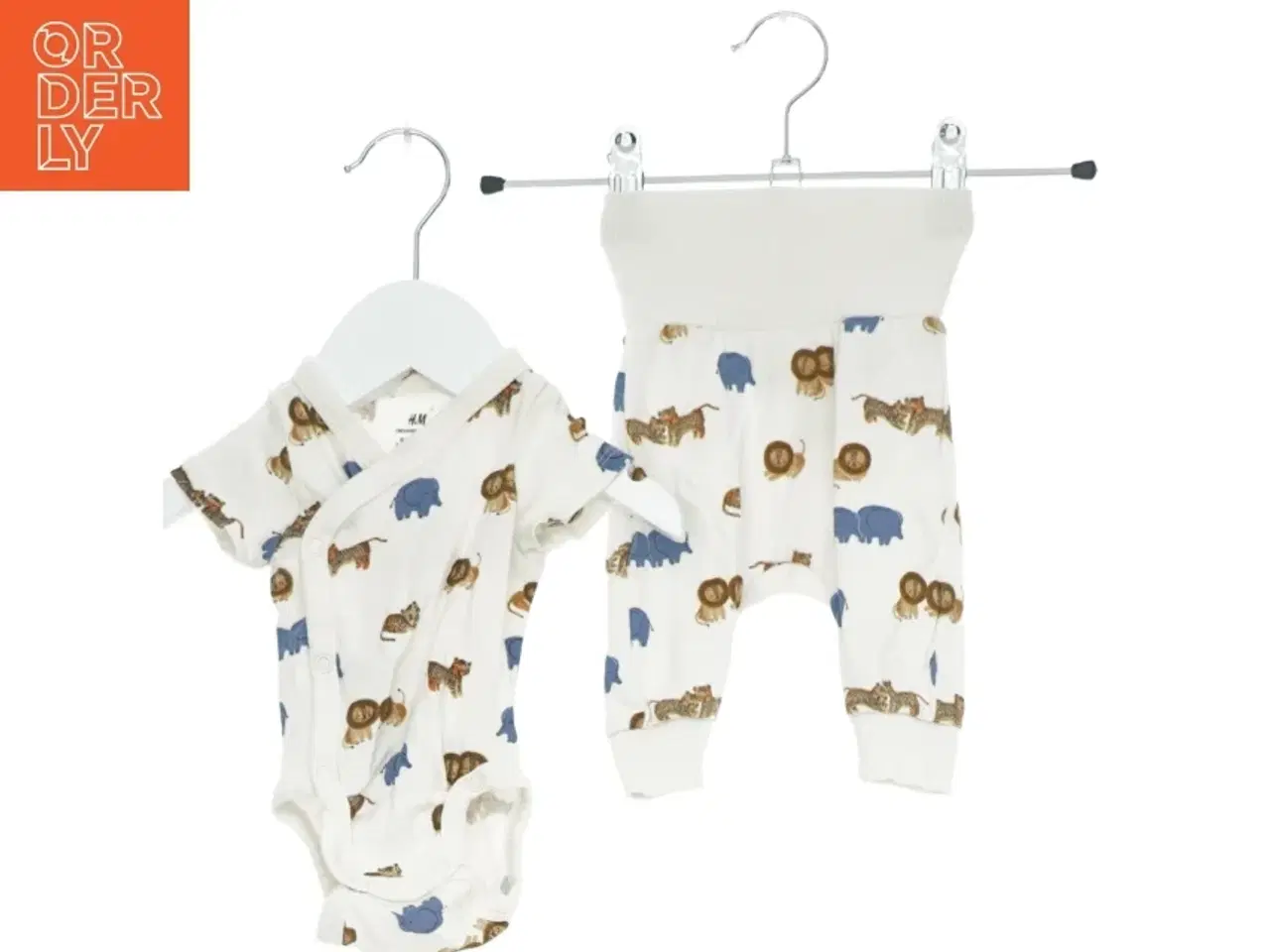 Billede 1 - Sæt med bodystocking og bukser med dyremønster fra H&M (str. 50)