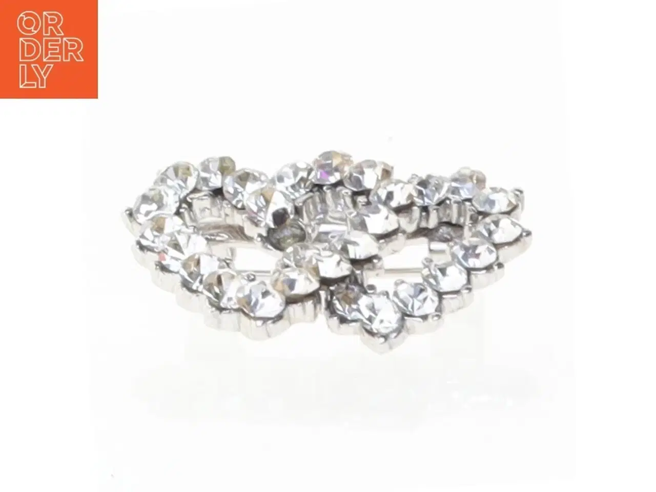 Billede 2 - Sølvfarvet broche med strass (str. 2,5 cm)