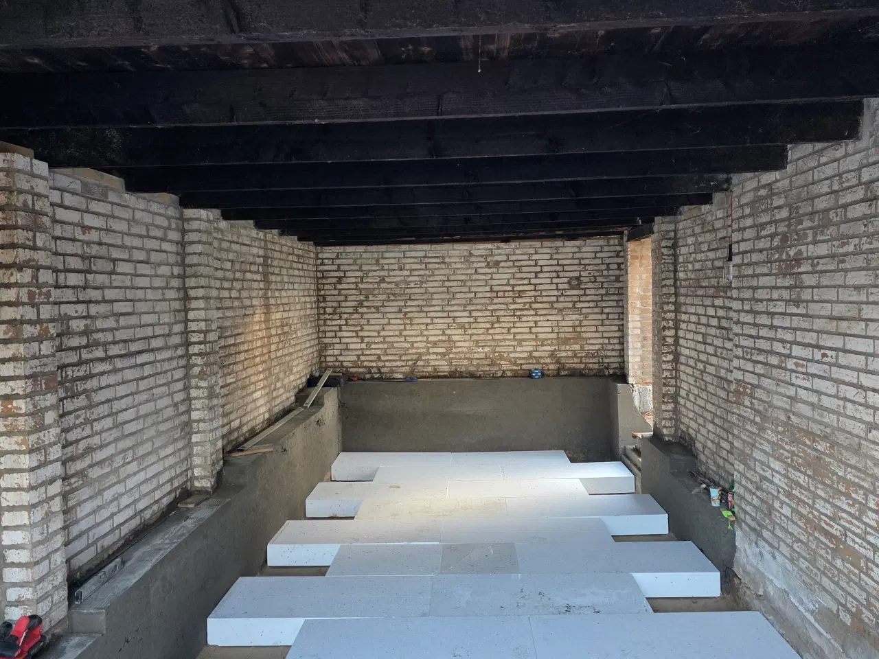 Billede 12 - Jeg udfører belægningsarbejde.