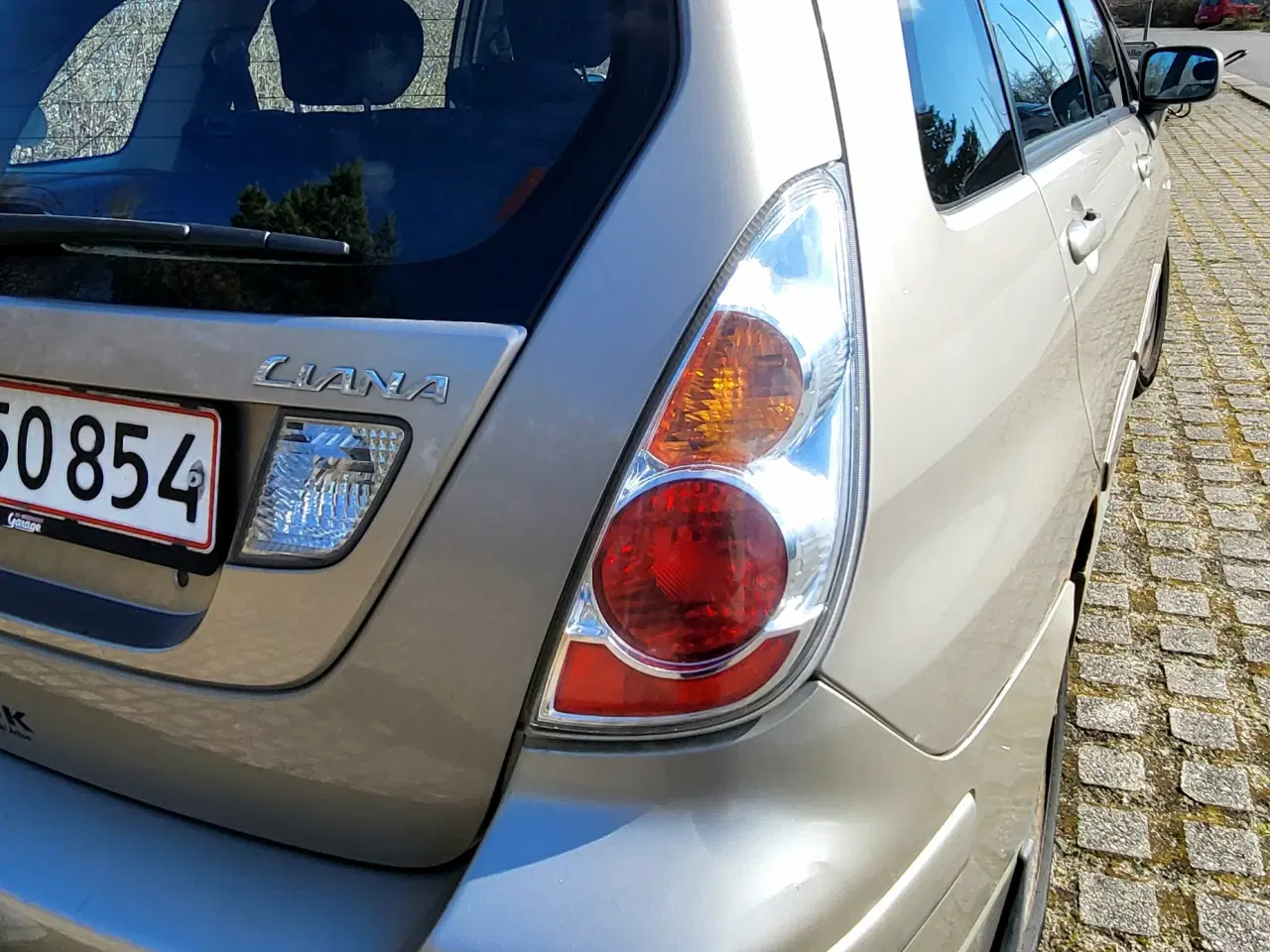 Billede 10 - ​Suzuki Liana 1,6 GLX – Nysynet, velholdt og hunde