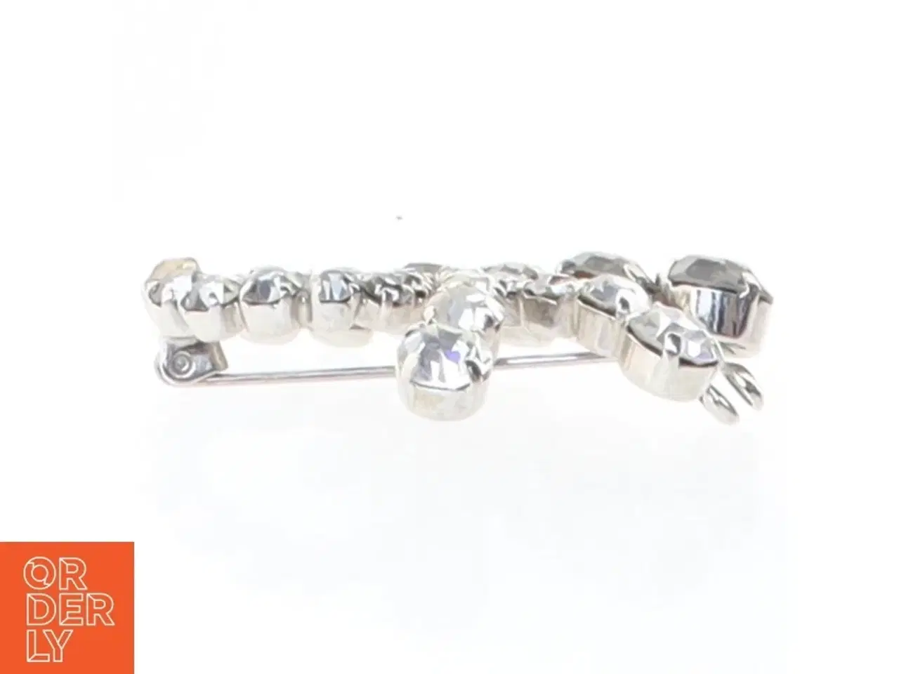 Billede 5 - Sølvfarvet broche med sten (str. 4 cm)