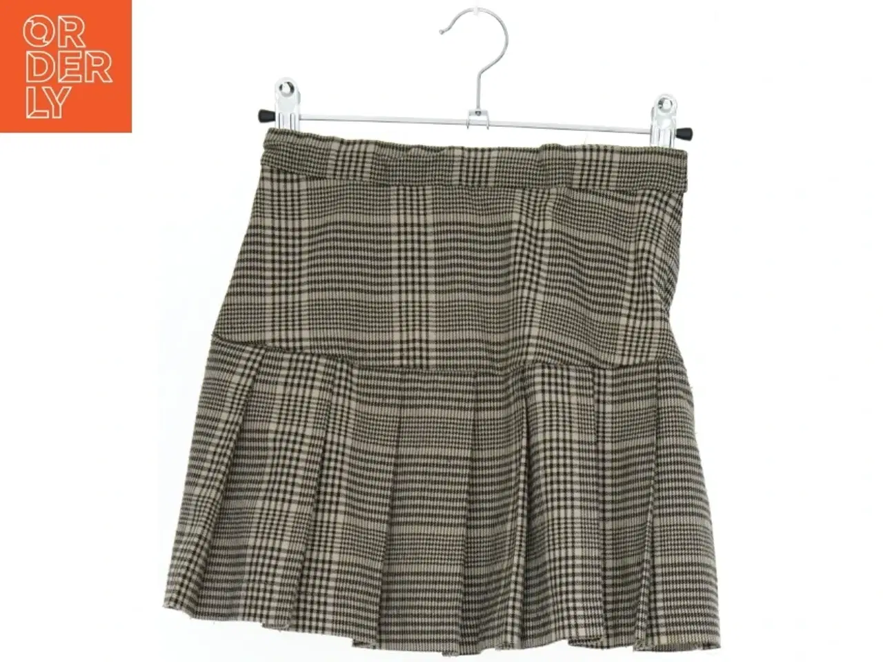 Billede 1 - Ternet nederdel fra H&M (str. 134)