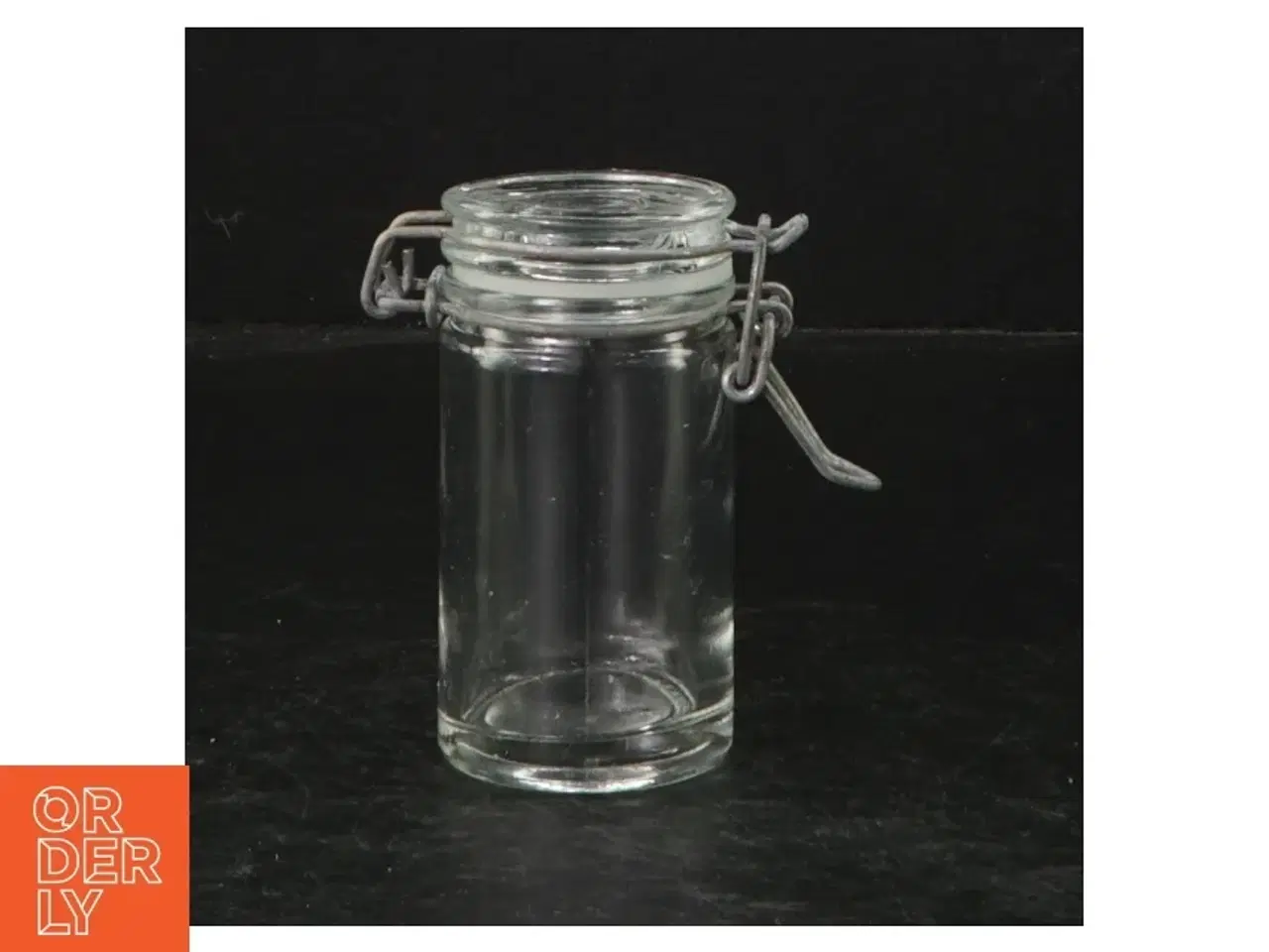 Billede 1 - Glasbeholder med lås (str. Ø. 4,5 cm. længde, 8,5 cm)