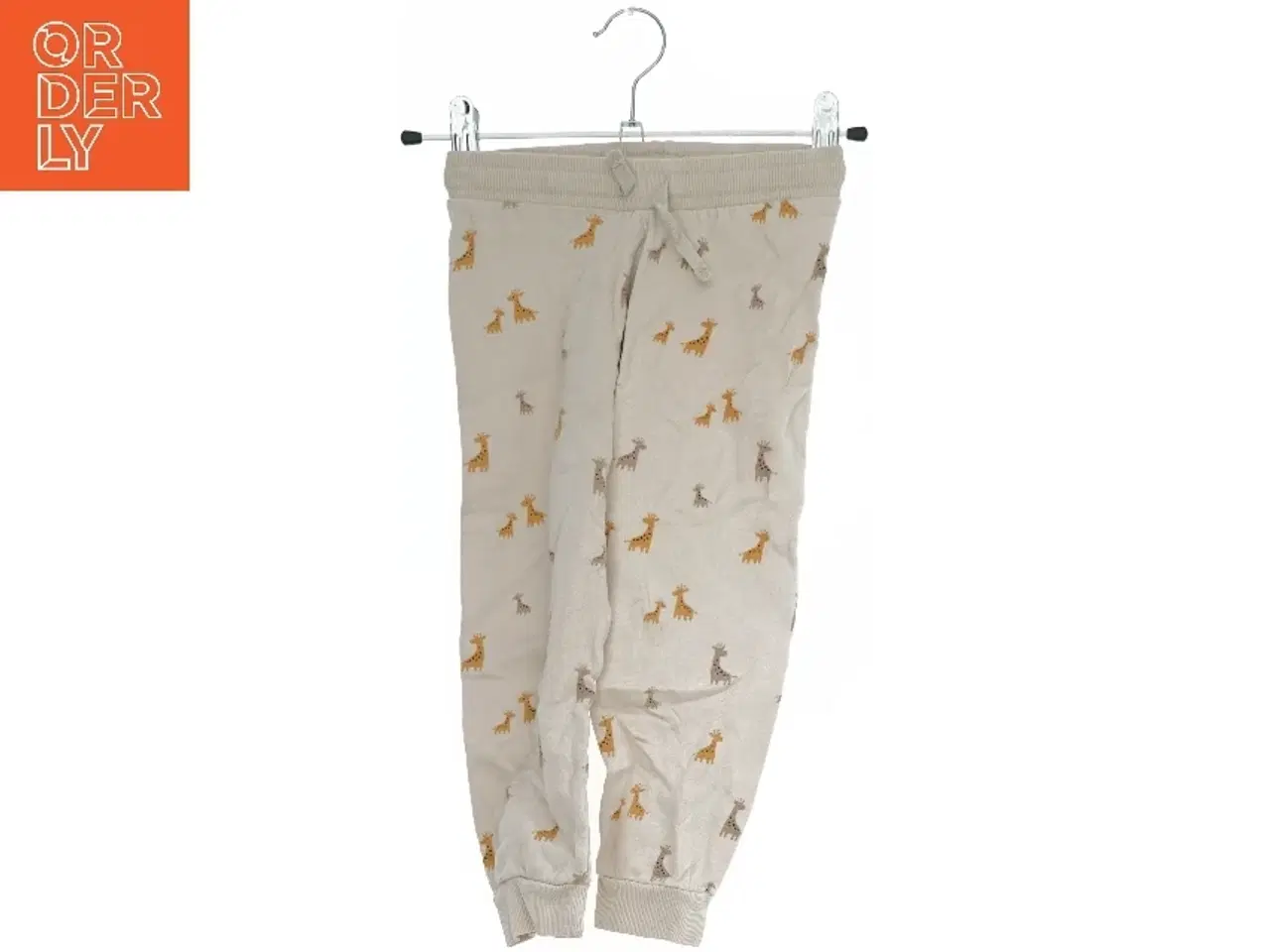 Billede 1 - Børnebukser med girafmønster fra H&M (str. 104)