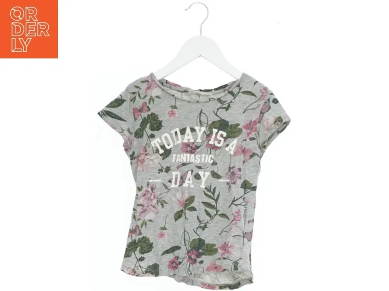 Billede 1 - Bluse med blomsterprint fra H&M (str. 140)