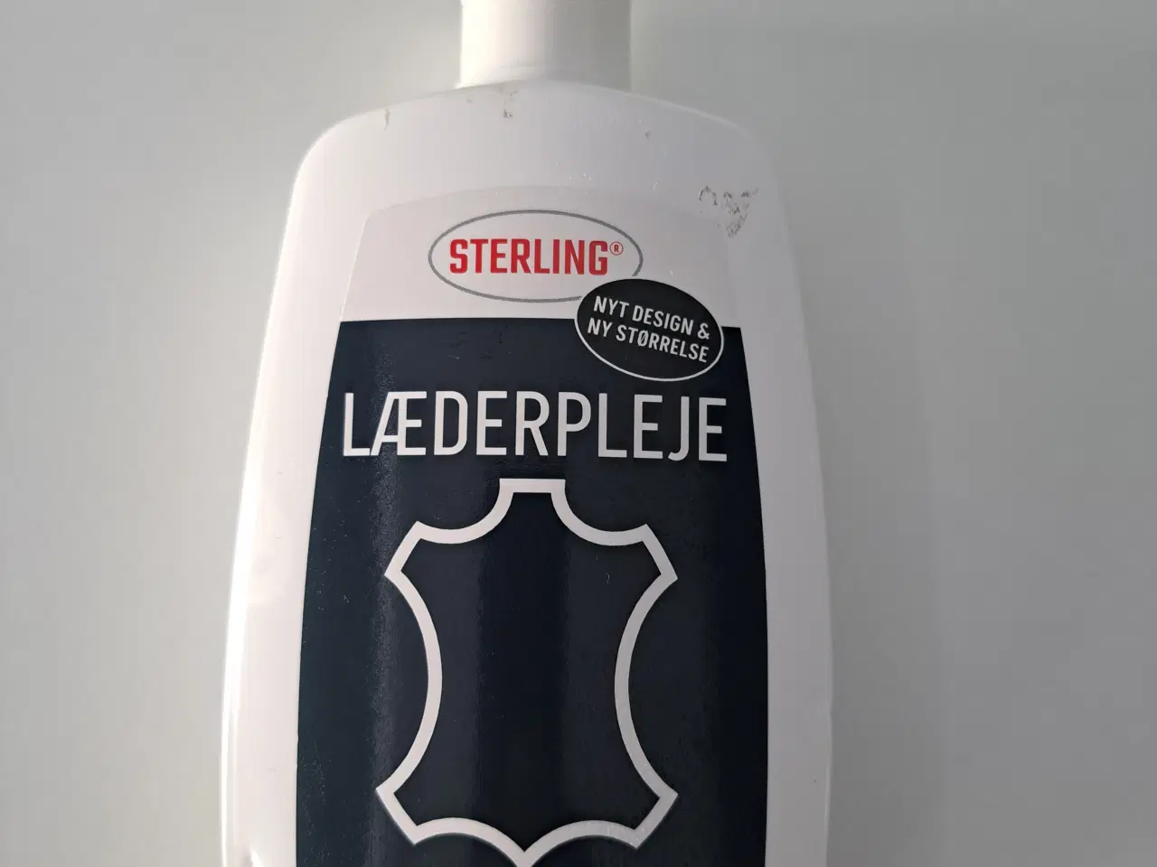 Billede 4 - Lækker lænestol med fodhviler i 100% okselæder.