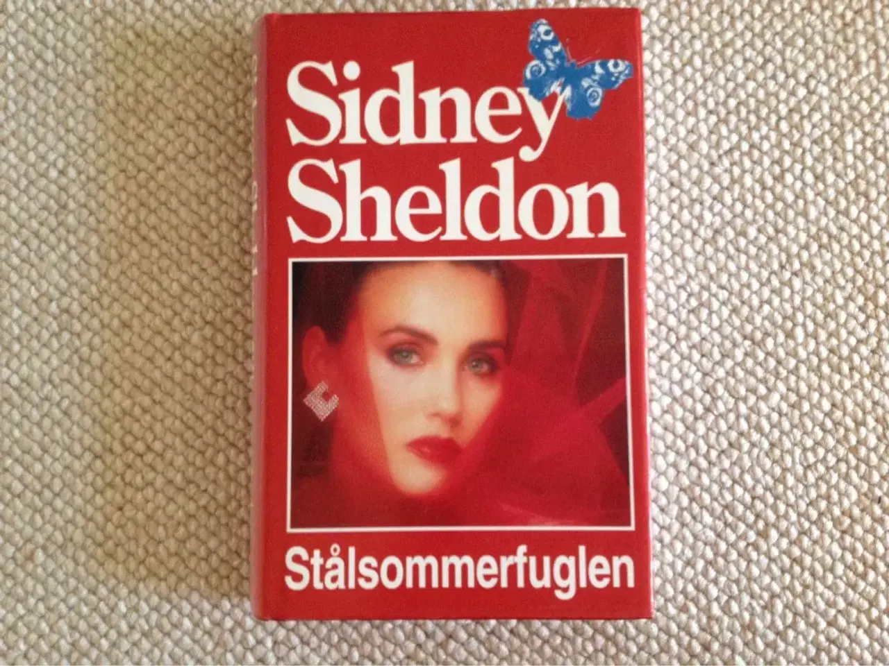 Billede 1 - Stålsommerfuglen" af Sidney Sheldon