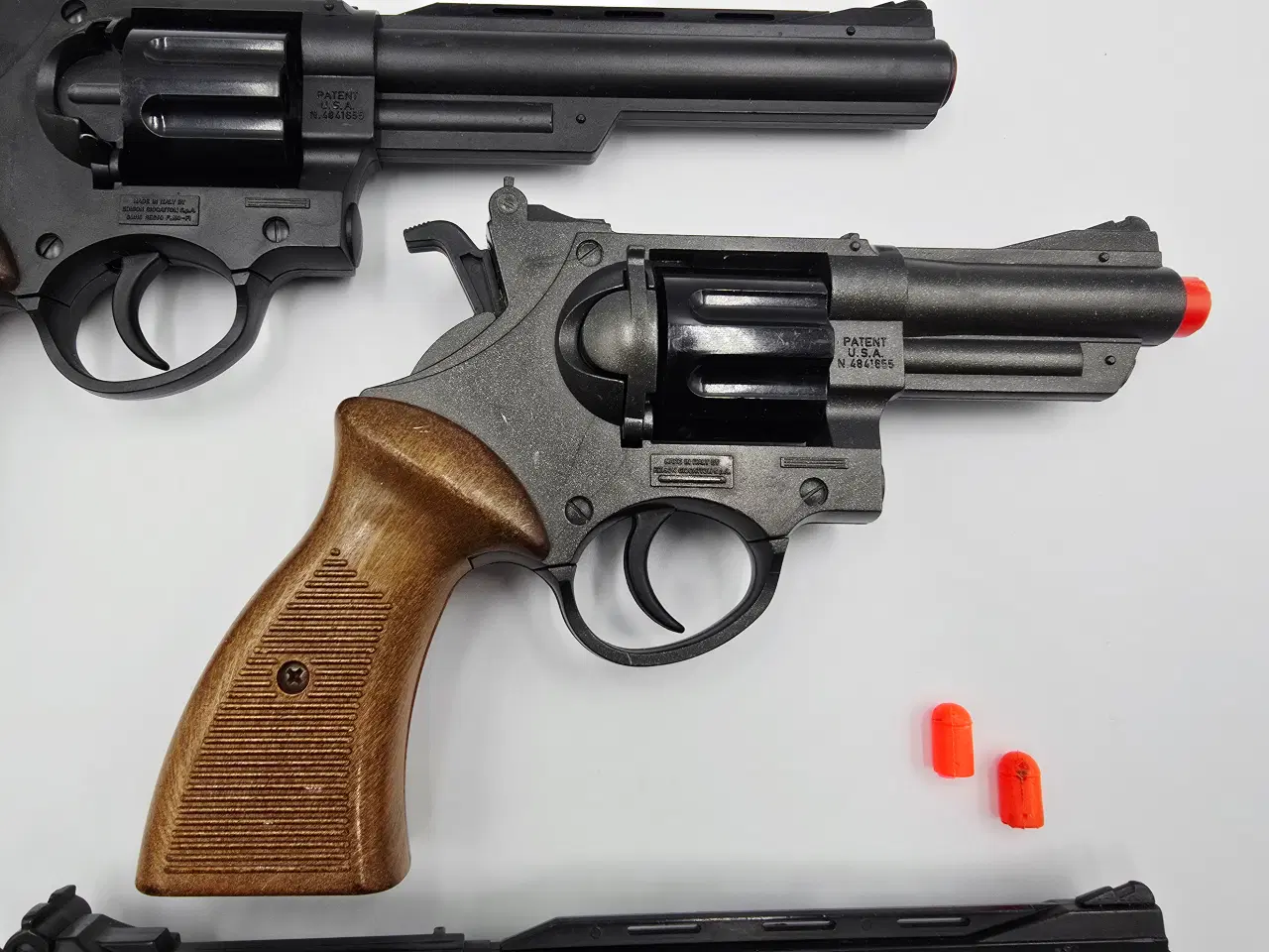 Billede 5 - 3 Stk. legetøjs pistoler der skyder røde propper