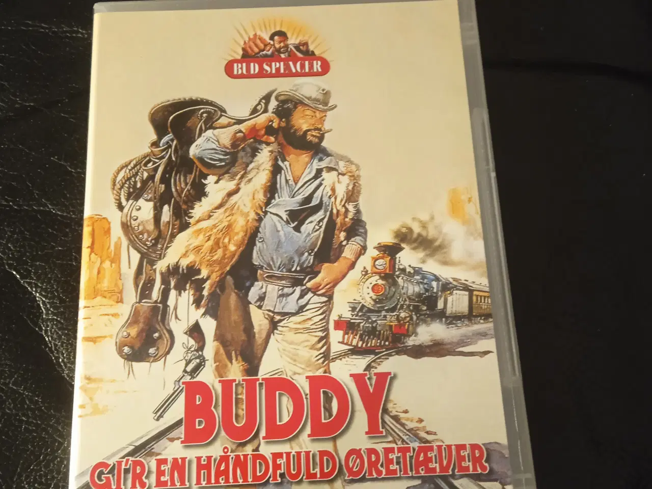 Billede 1 - Buddy gir en håndfuld øretæver 