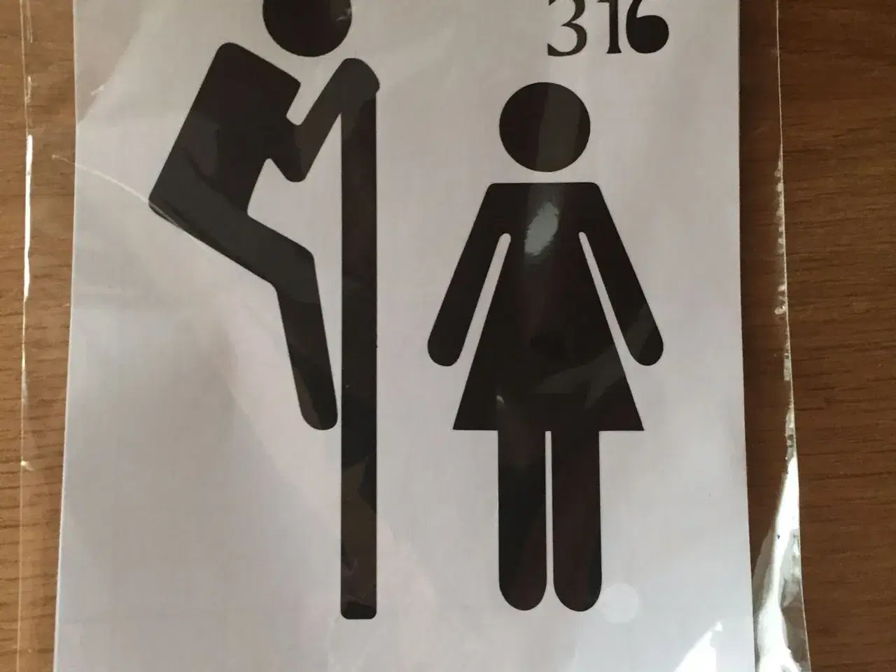 Billede 1 - Nye stickers til toiletdør