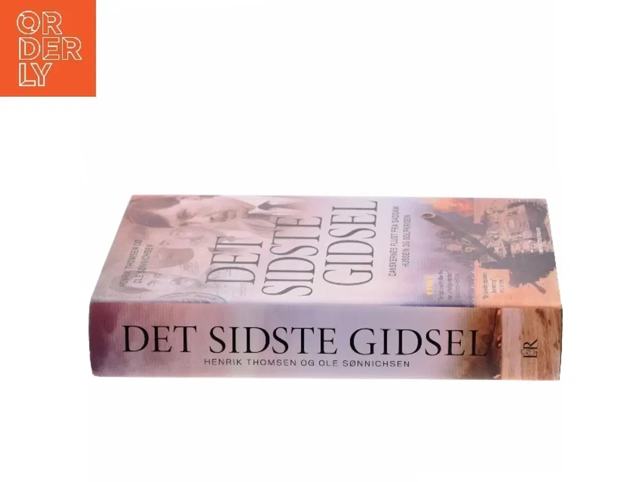 Billede 2 - Det sidste gidsel : danskernes flugt fra Saddam Hussein og Golfkrigen af Henrik Thomsen (f. 1958) (Bog)