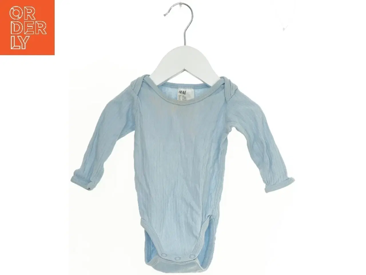Billede 1 - Lys Blå Bodystocking fra H&M (str. 62)