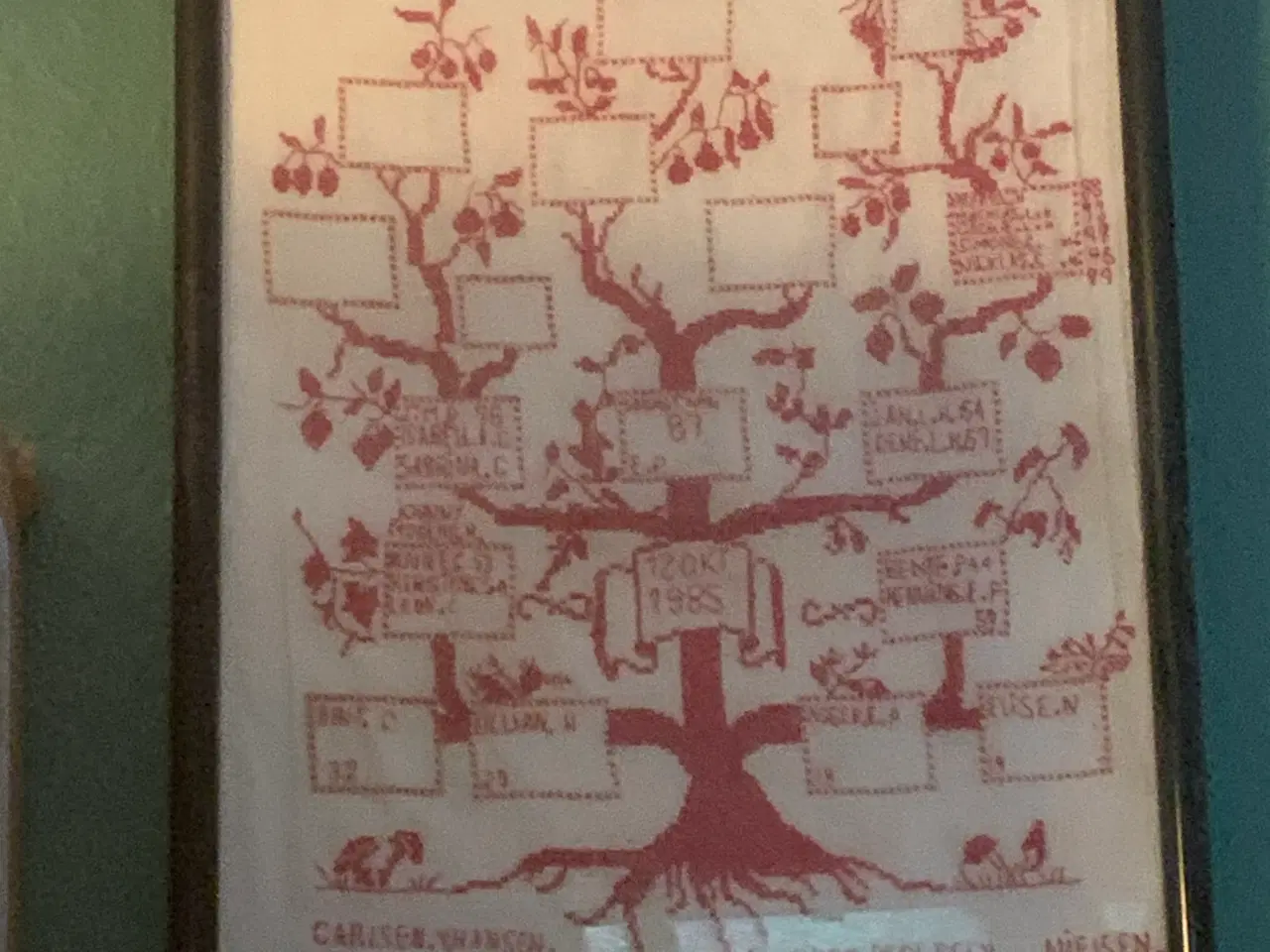 Billede 1 - Indrammet navneklud i hør.