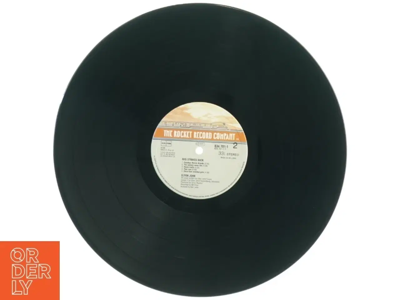 Billede 4 - Elton John - Reg Strikes Back LP fra The Rocket Record Company (str. 31 x 31 cm)