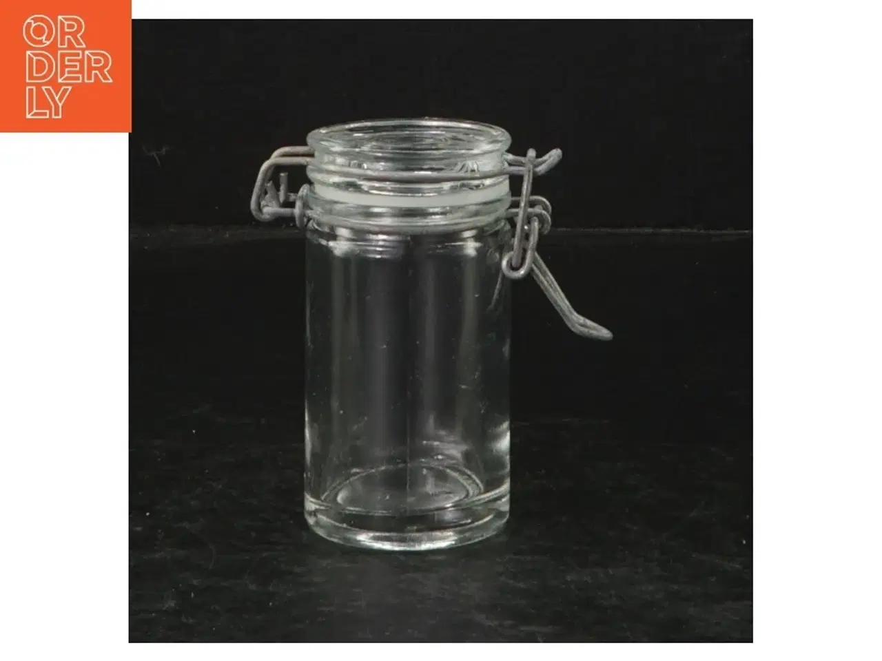 Billede 1 - Glasbeholder med lås (str. Ø. 4,5 cm. længde, 8,5 cm)