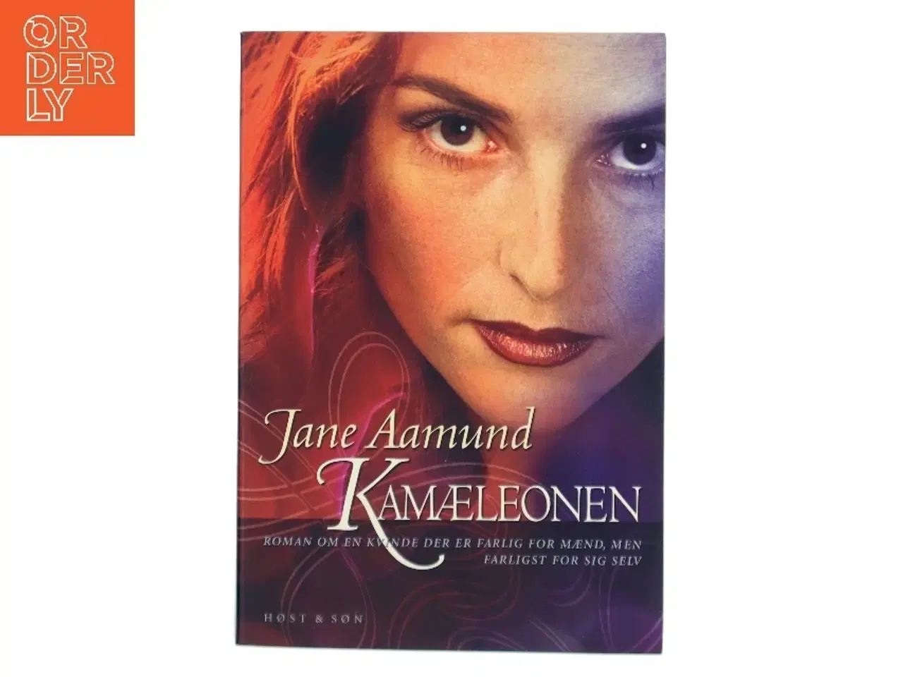 Billede 1 - Kamæleonen : roman om en kvinde, der er farlig for mænd, men farligst for sig selv af Jane Aamund (Bog)
