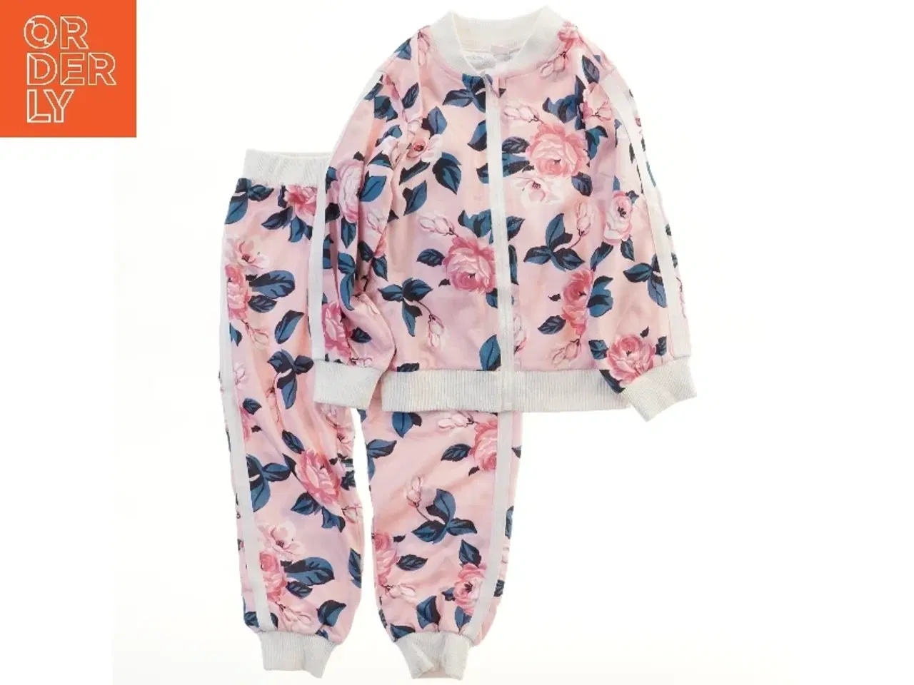 Billede 1 - Blomster-mønstret træningsdragt til børn (str. 122)