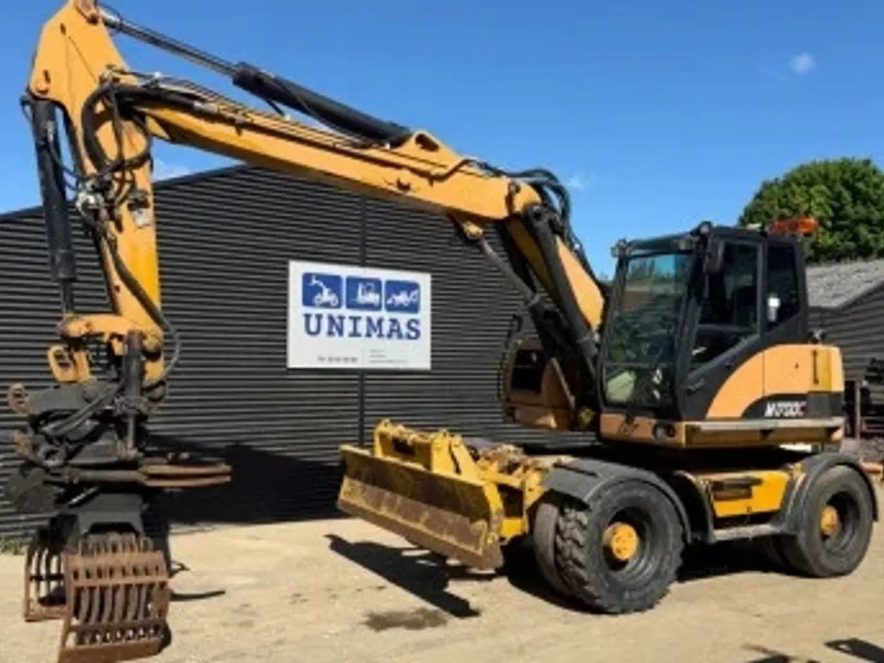 Billede 1 - Hjulgravemaskine med Rotortilt 