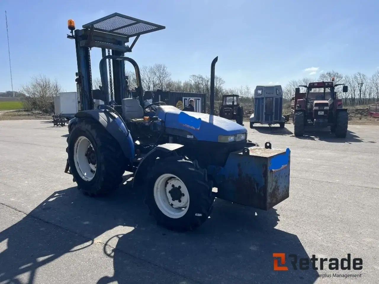 Billede 3 - New Holland TN55 Udstyret som byggelift med bagmonteret hydraulisk byggelift, med pallegafler