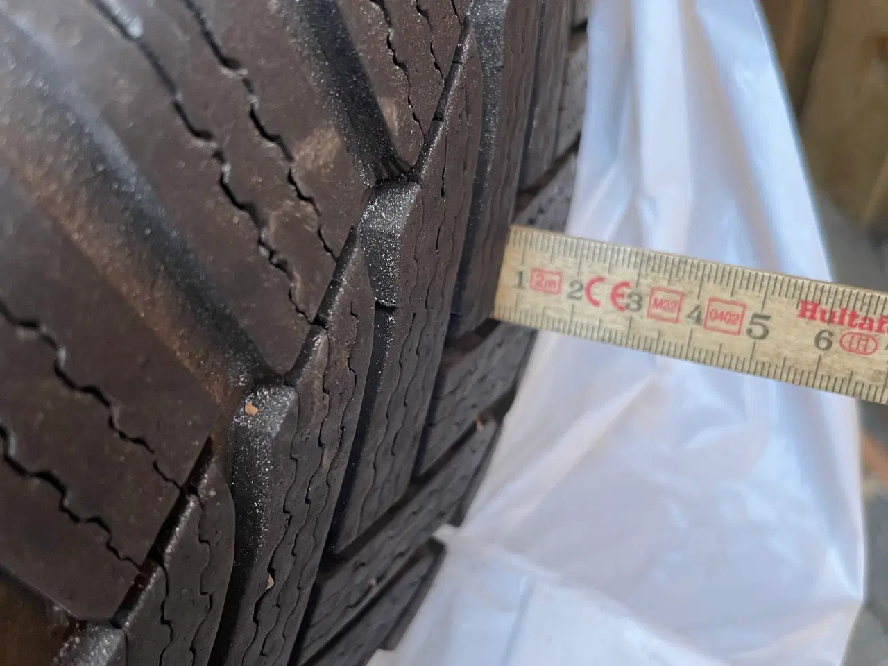 Billede 3 - Vinterdæk på originale Nissan alufælge
