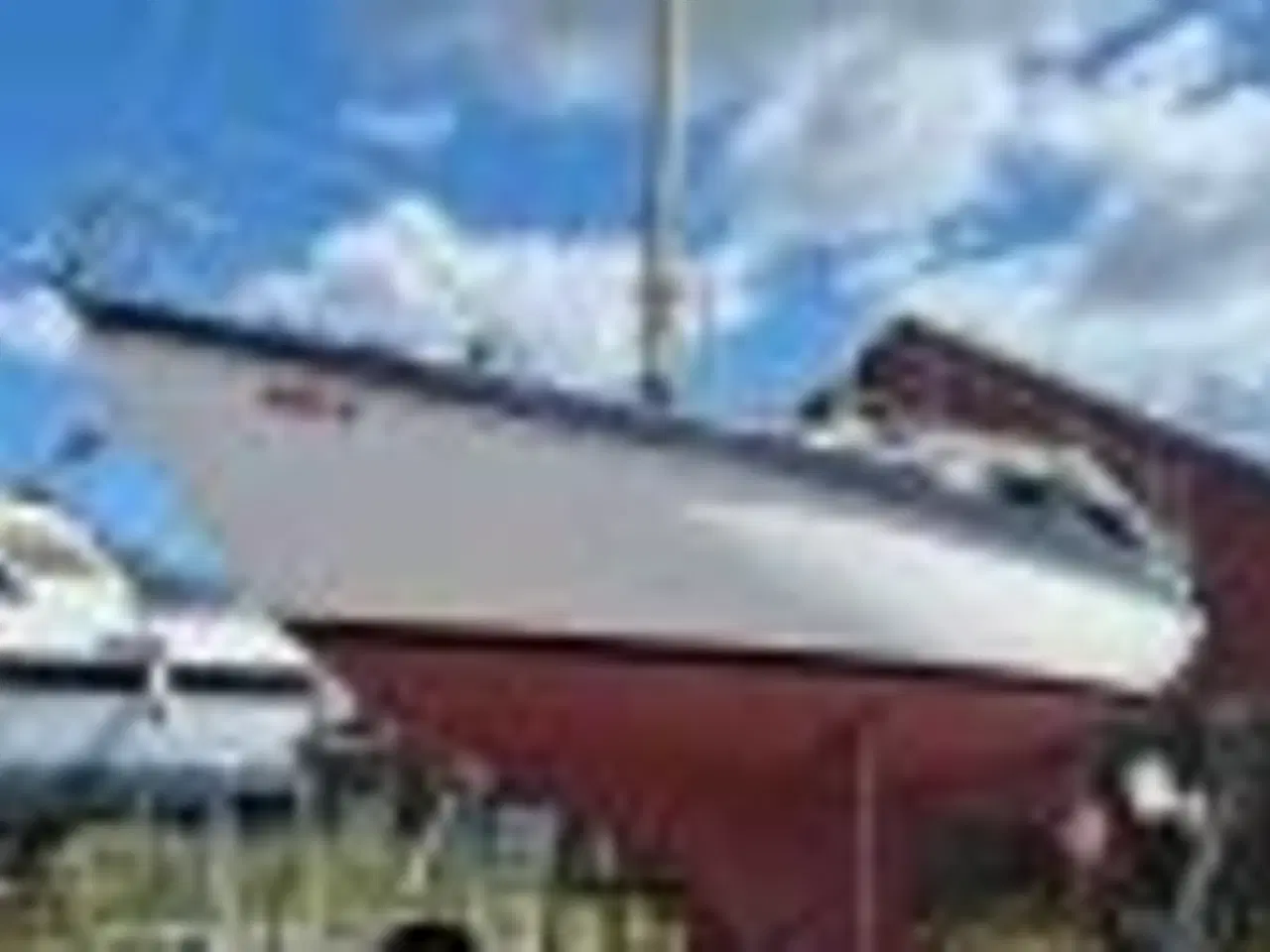 Billede 2 - Danboat 29, sejlbåd ligger på land.