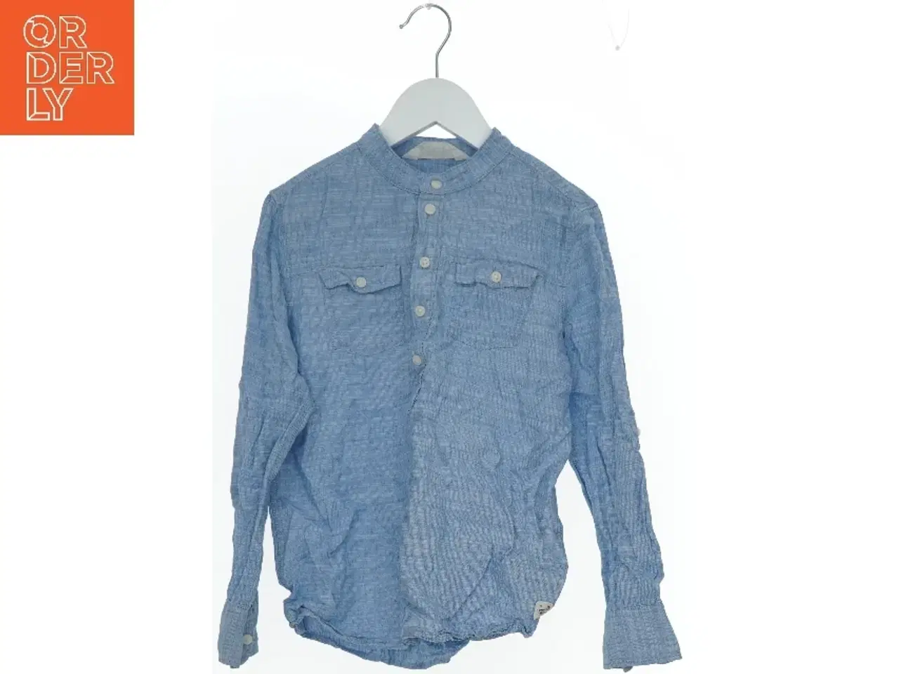 Billede 1 - Lyseblå skjorte med lange ærmer fra H&M (str. 134)