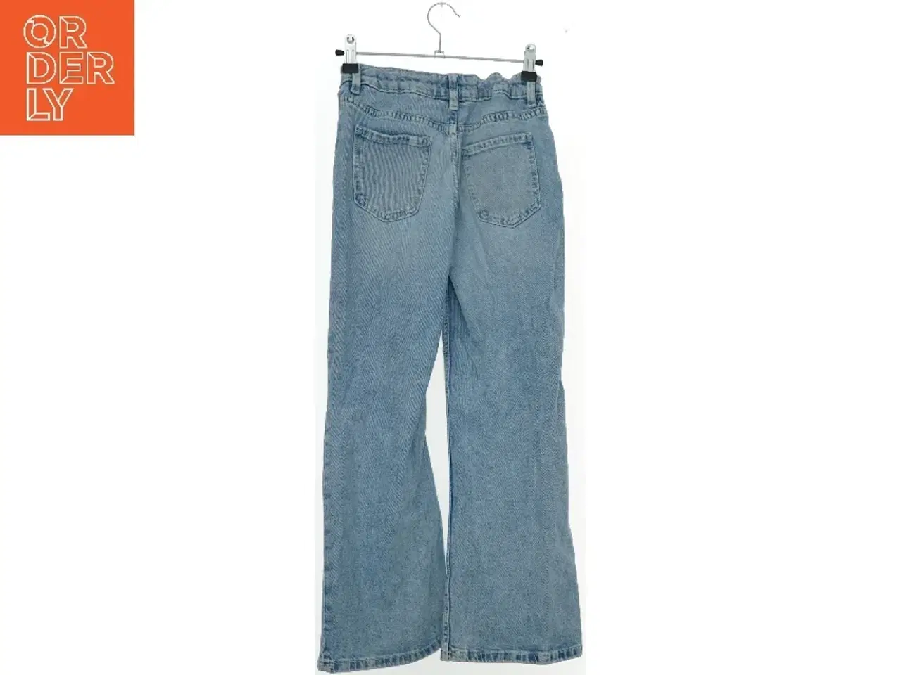 Billede 2 - Lyseblå jeans fra H&M (str. 134)
