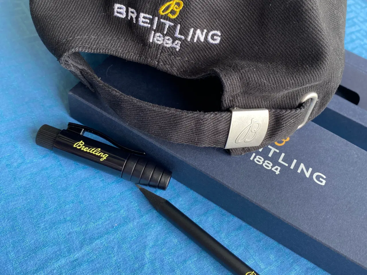 Billede 4 - Breitling: kasket/ merchandise + blyant med viskel