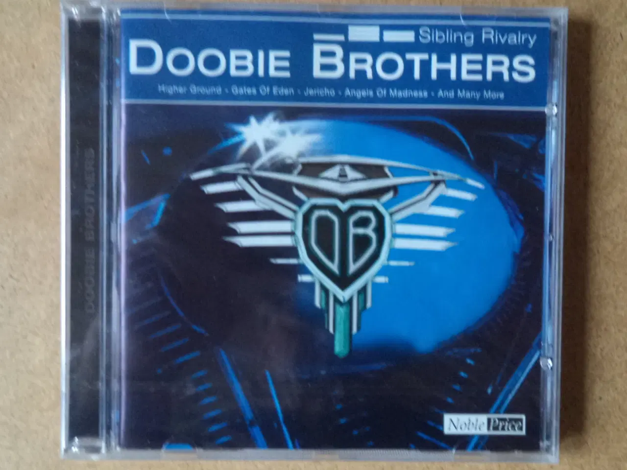 Billede 1 - Doobie Brothers ** Sibling Rivalry (221895-205)   