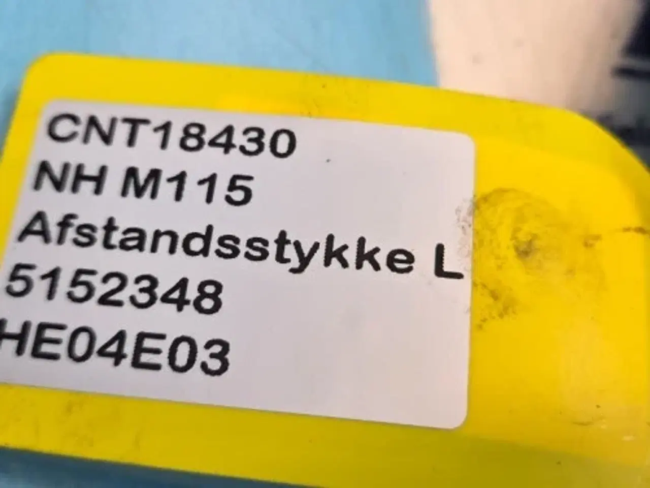 Billede 13 - New Holland TM115 Afstandsstykke L  5152348