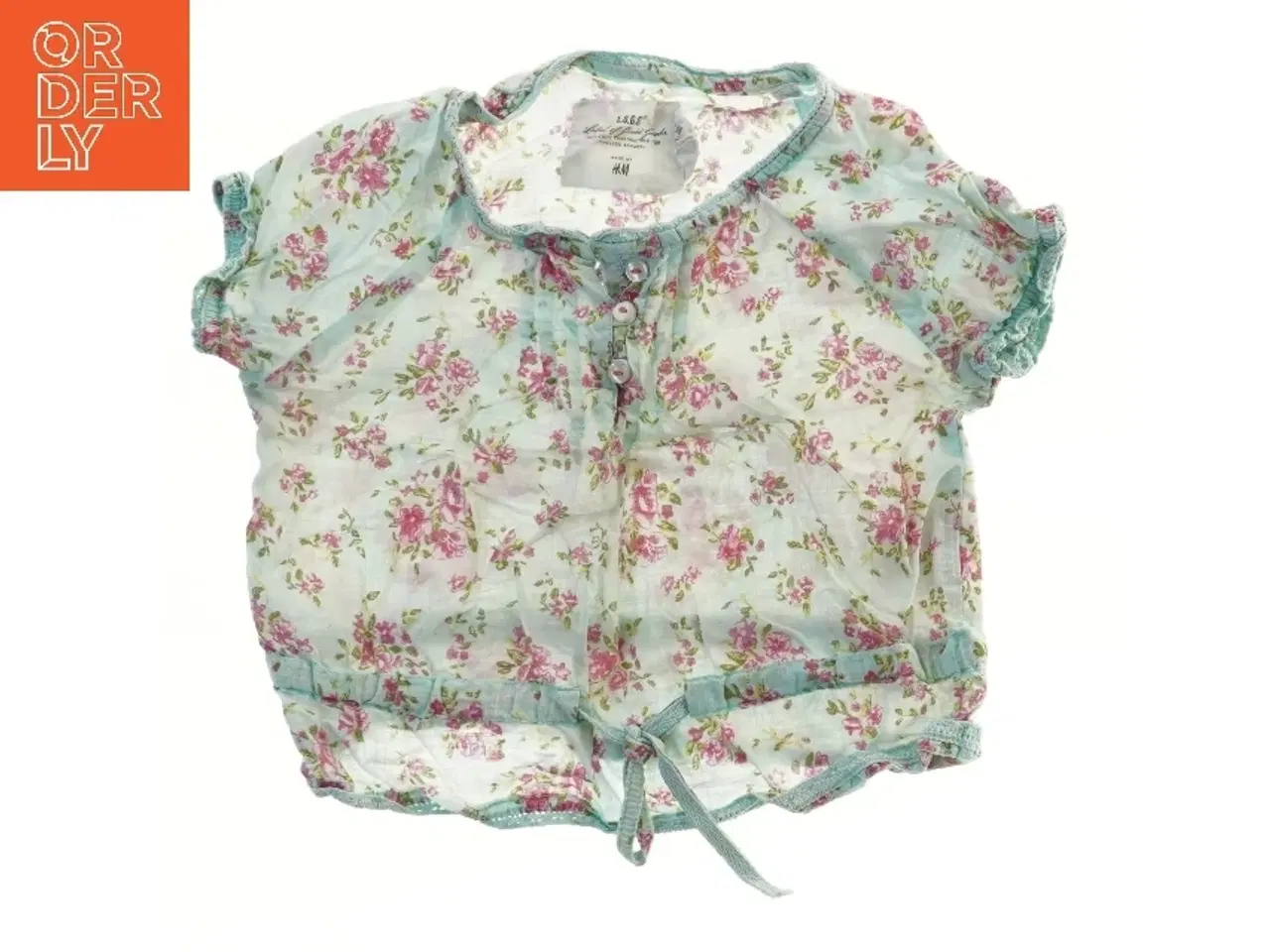 Billede 1 - Blomstret kortærmet bluse fra H&M (str. 98)