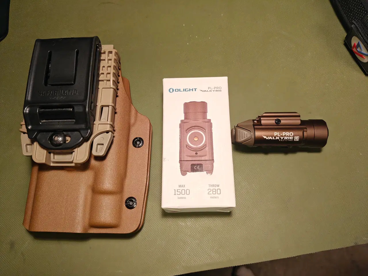 Billede 1 - Fed hylster med Olight Lygte