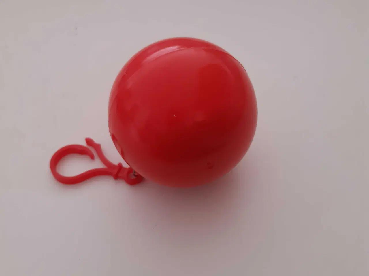 Billede 1 - Regnfrakke I nøglering