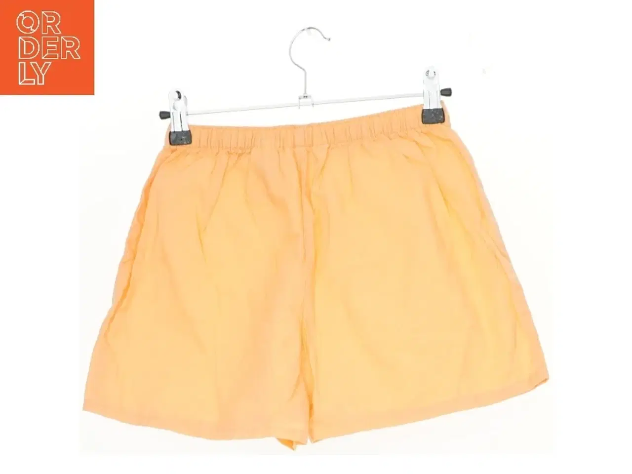 Billede 2 - Orange shorts fra H&M (str. 134)