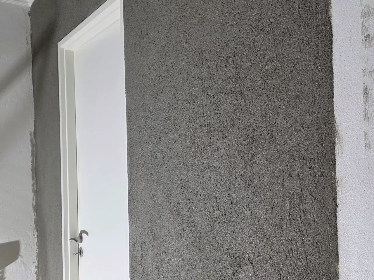 Billede 18 - Jeg udfører belægningsarbejde.