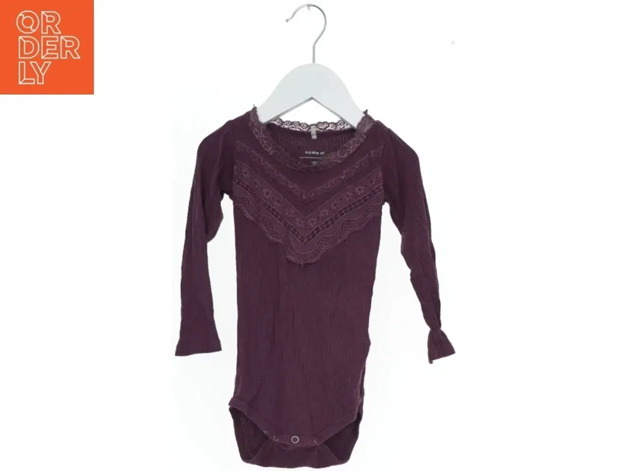 Billede 1 - Langærmet bodystocking med blonde detaljer fra Name It (str. 86)