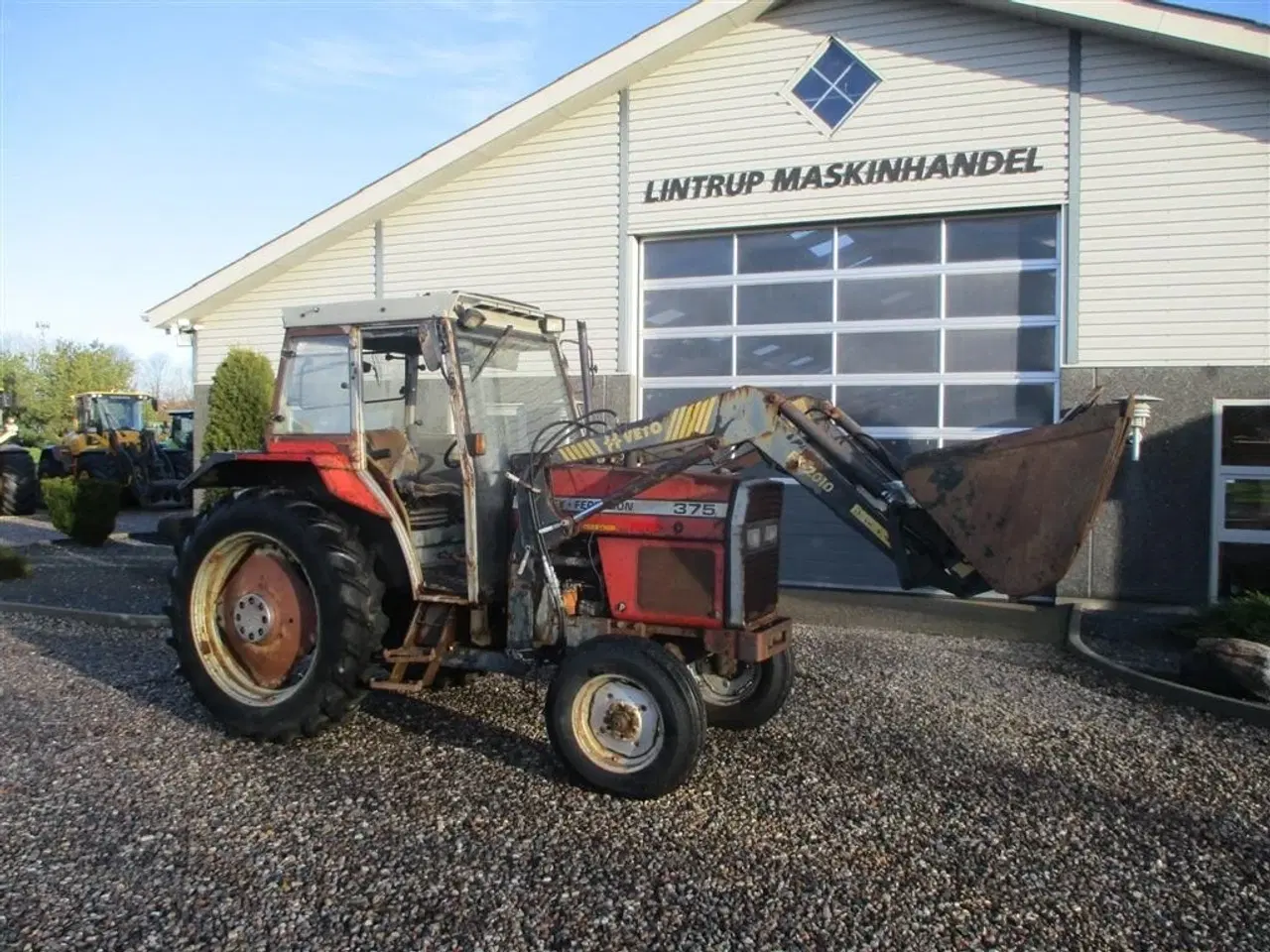 Billede 15 - Massey Ferguson 375 HiLine med frontlæsser