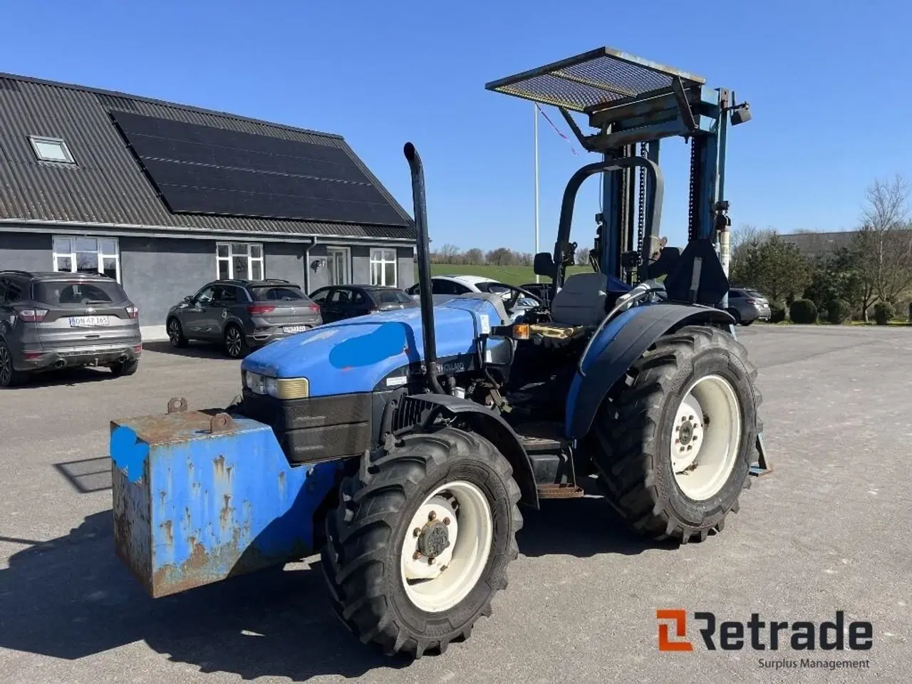 Billede 1 - New Holland TN55 Udstyret som byggelift med bagmonteret hydraulisk byggelift, med pallegafler