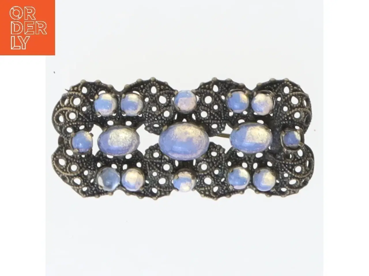 Billede 1 - Dekorativ broche med blå sten (str. 5,5x2,5 cm)