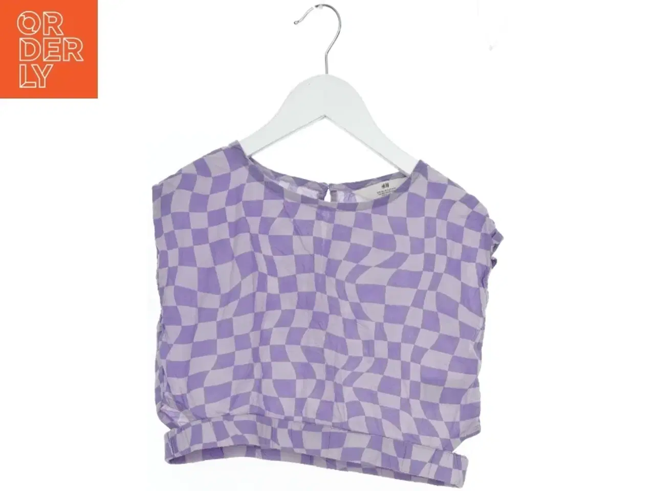 Billede 1 - Kortærmet bluse med bølgemønster fra H&M (str. 134)