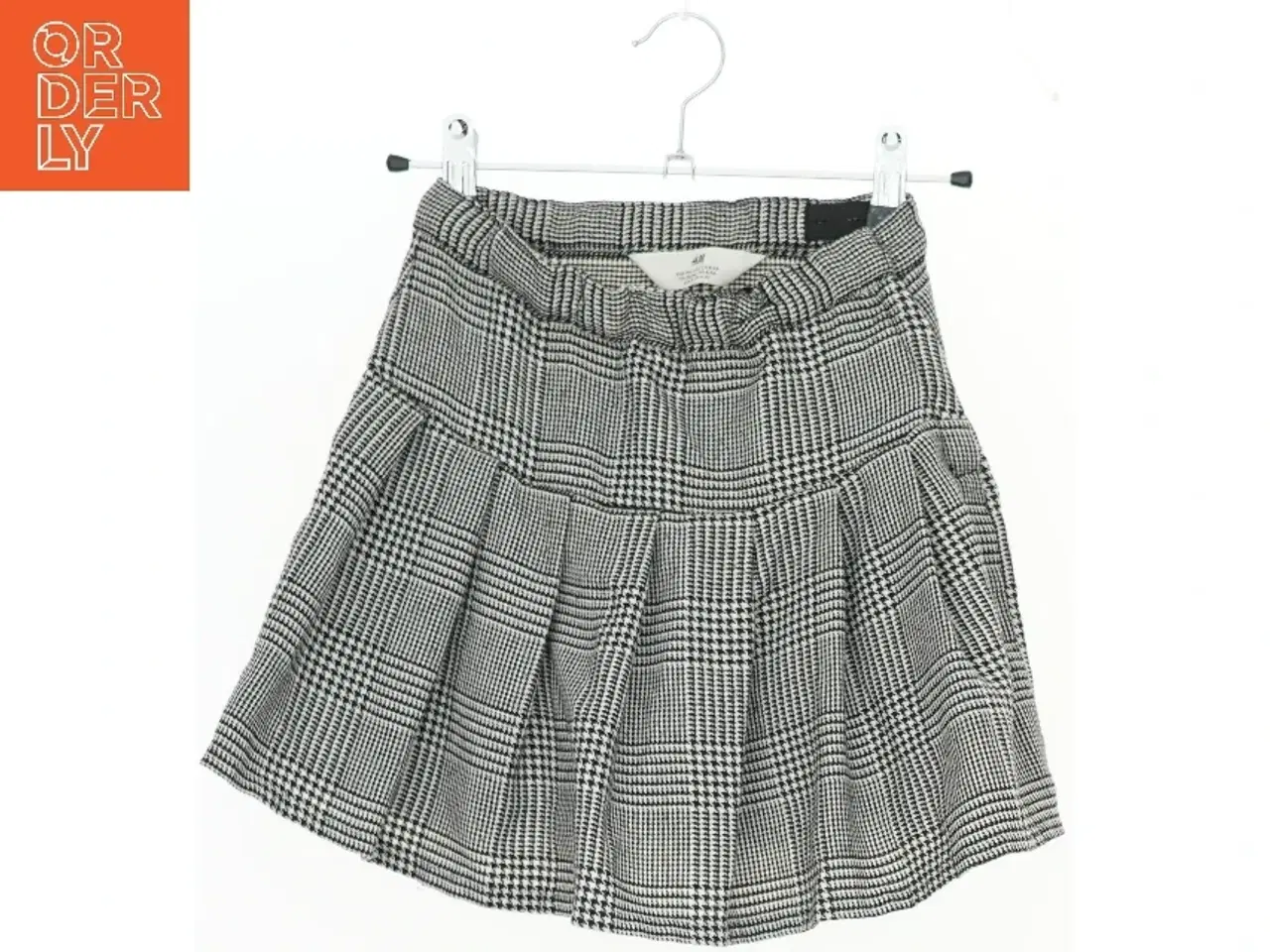 Billede 1 - Ternet nederdel med plisseringer fra H&M (str. 134)