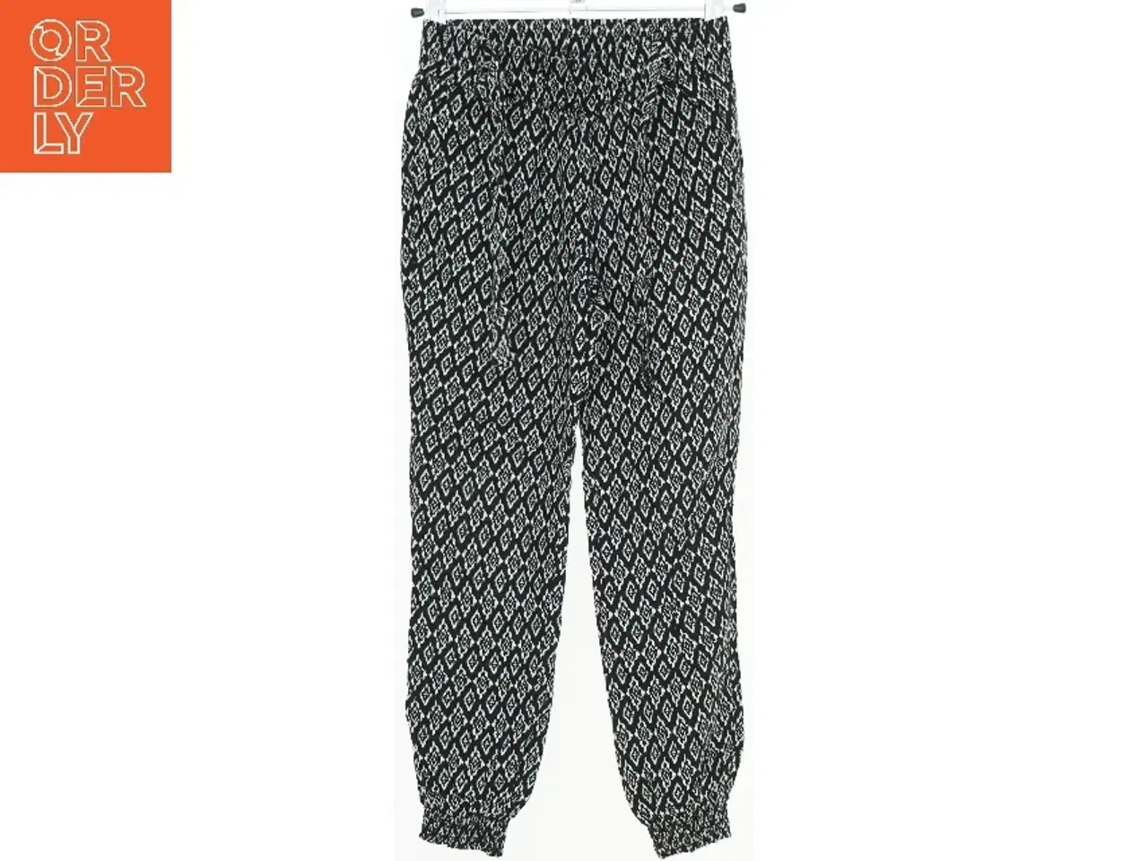 Billede 1 - Mønstrede joggingbukser fra YD (str. 128)