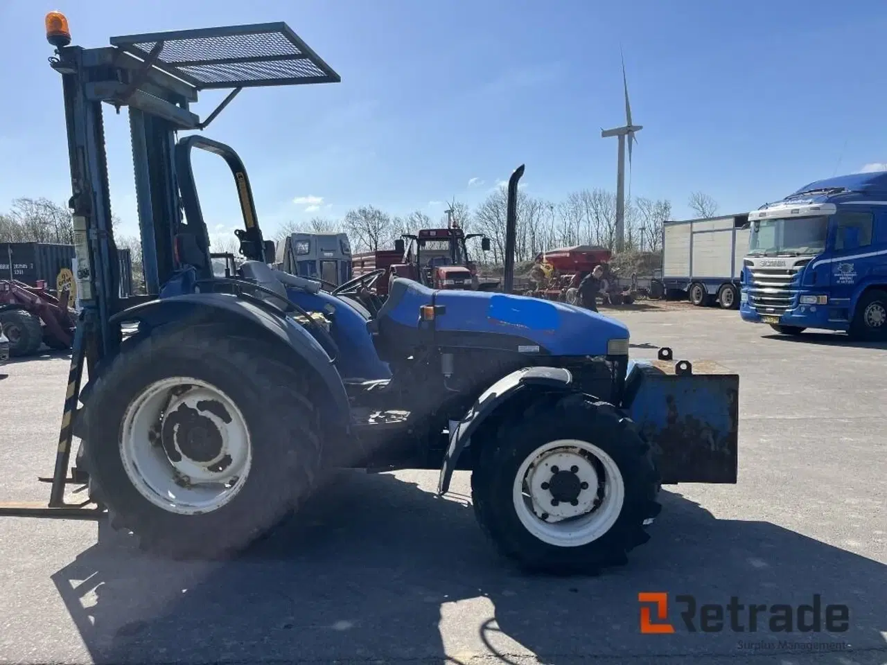 Billede 4 - New Holland TN55 Udstyret som byggelift med bagmonteret hydraulisk byggelift, med pallegafler